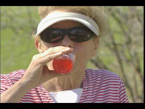 Active Seniors Enjoying Isopure Plus while Golfing
