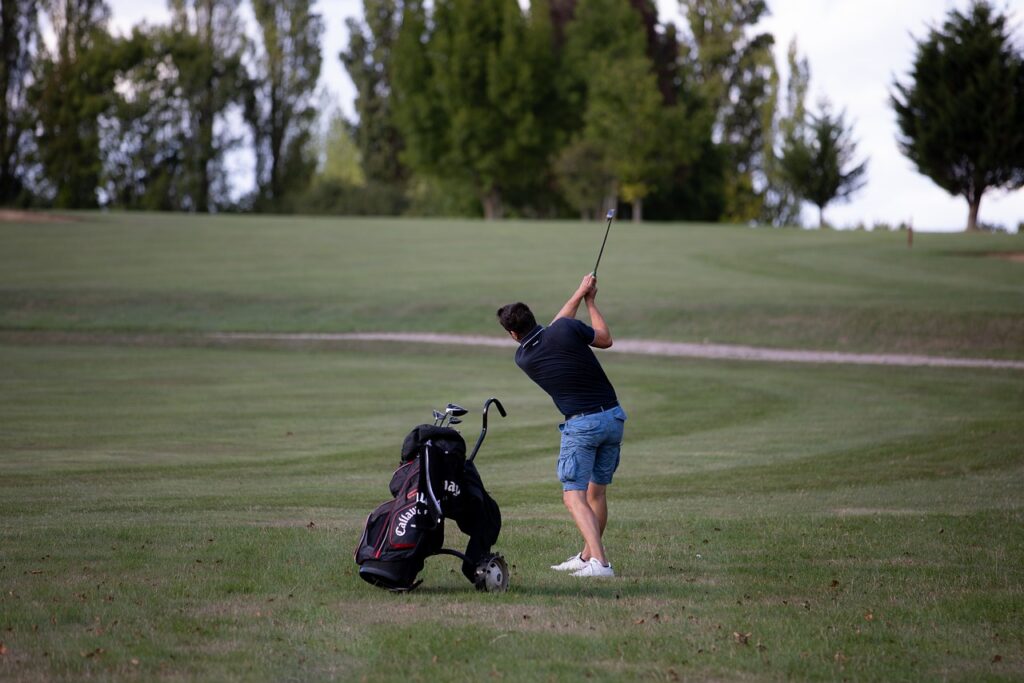 How Do I Adjust For Wind Conditions When Selecting A Club?